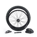 Arctic Leopard XE Pro R wheel assembly: spoked wheel with knobby off-road tire mounted, shown with inner tube, rim tape and valve tool