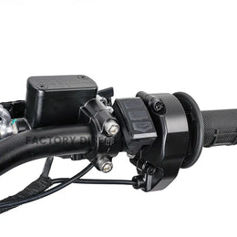 Handlebar controls on the Arctic Leopard XE Pro R, showing the hydraulic brake master cylinder and mode switch